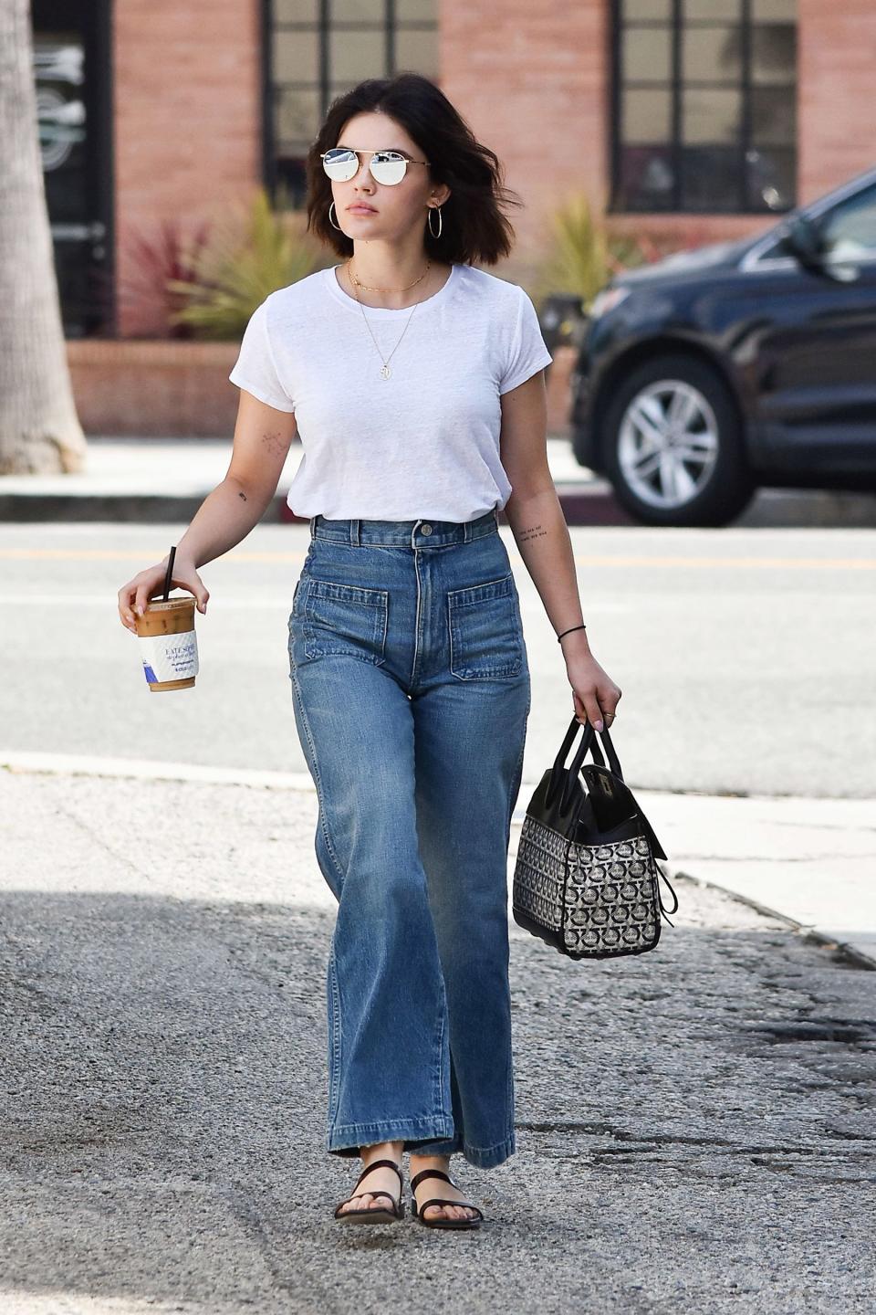 Lucy Hale goes casual during a walk around New York City on Friday.