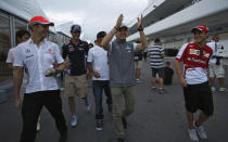 (L-R) McLaren Formula One driver Jenson Button of Britain, Red Bull Formula One driver Mark Webber of Australia, Mercedes Formula One driver Lewis Hamilton of Britain, Mercedes Formula One driver Nico Rosberg of Germany and Ferrari Formula One driver Felipe Massa of Brazil walk after the second practice session of the Japanese F1 Grand Prix at the Suzuka circuit October 11, 2013. REUTERS/Issei Kato (JAPAN - Tags: SPORT MOTORSPORT F1 TPX IMAGES OF THE DAY)