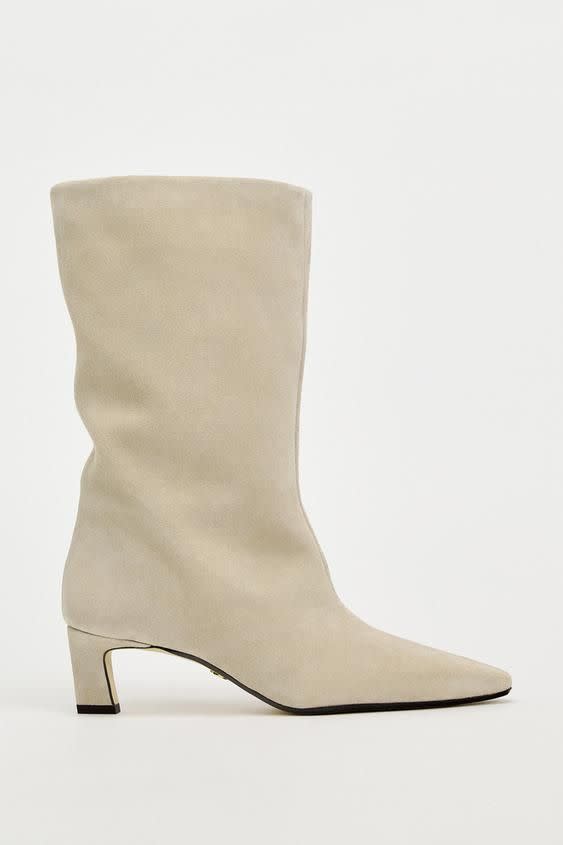 <p><a href="https://go.redirectingat.com?id=74968X1596630&url=https%3A%2F%2Fwww.zara.com%2Fus%2Fen%2Fmid-height-shaft-suede-boots-p11132310.html&sref=https%3A%2F%2Fwww.cosmopolitan.com%2Fstyle-beauty%2Ffashion%2Fa60193492%2Ffall-shoe-trends-2024%2F" rel="nofollow noopener" target="_blank" data-ylk="slk:Shop Now;elm:context_link;itc:0;sec:content-canvas" class="link ">Shop Now</a></p><p>Zara Mid-Height Shaft Boots </p><p>zara.com</p><p>$159.00</p>