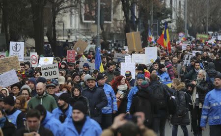 People demonstrate against a cabinet decree passed earlier in the week decriminalising some graft offences, in Bucharest, Romania February 4, 2017. REUTERS/Stoyan Nenov