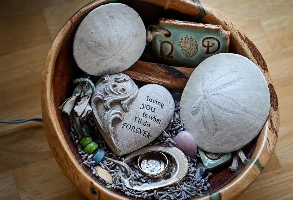 Calling it their “wedding bowl,” Neal and Nancy Dawson have a collection of mementos from their years together living in the El Portal Trailer Park on Sunday, March 13, 2022.