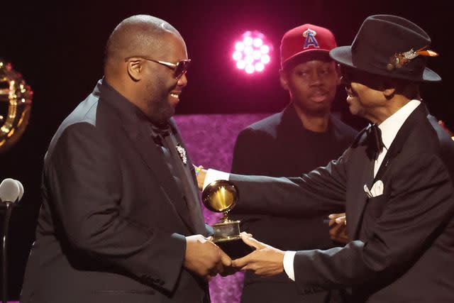 <p>Amy Sussman/Getty</p> Killer Mike accepting the Grammy for best rap song in Los Angeles on Feb. 4, 2024