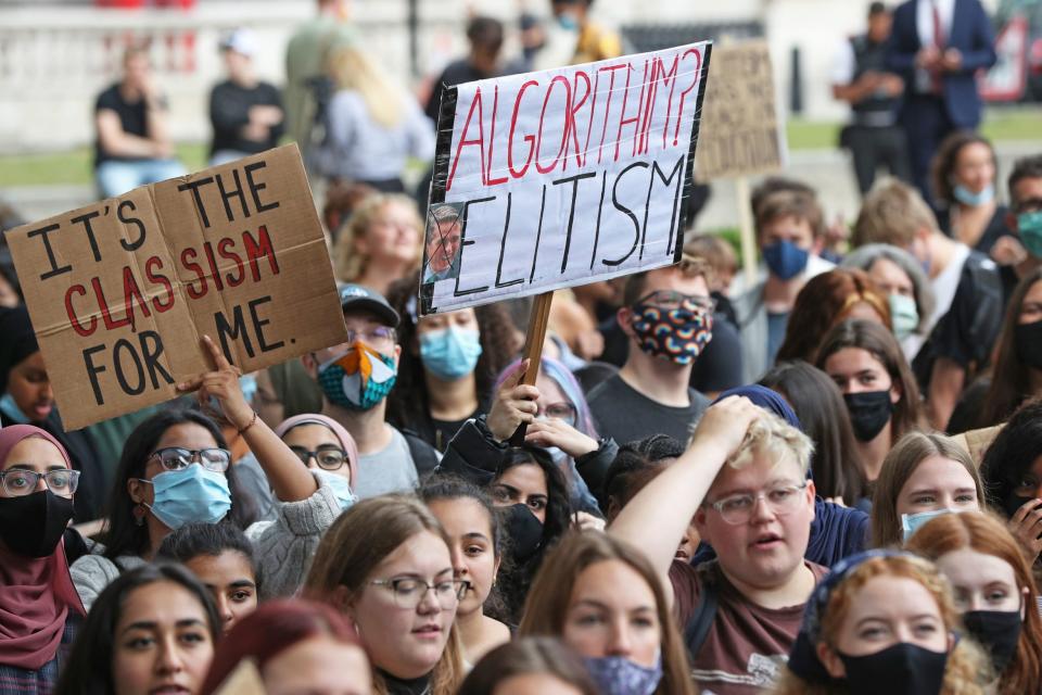 Students take part in a peaceful protest in Parliament Square in response to the downgrading of A-level results (PA)