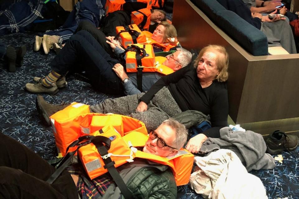 Passengers on board the Viking Sky, waiting to be evacuated, off the coast of Norway. (AP)