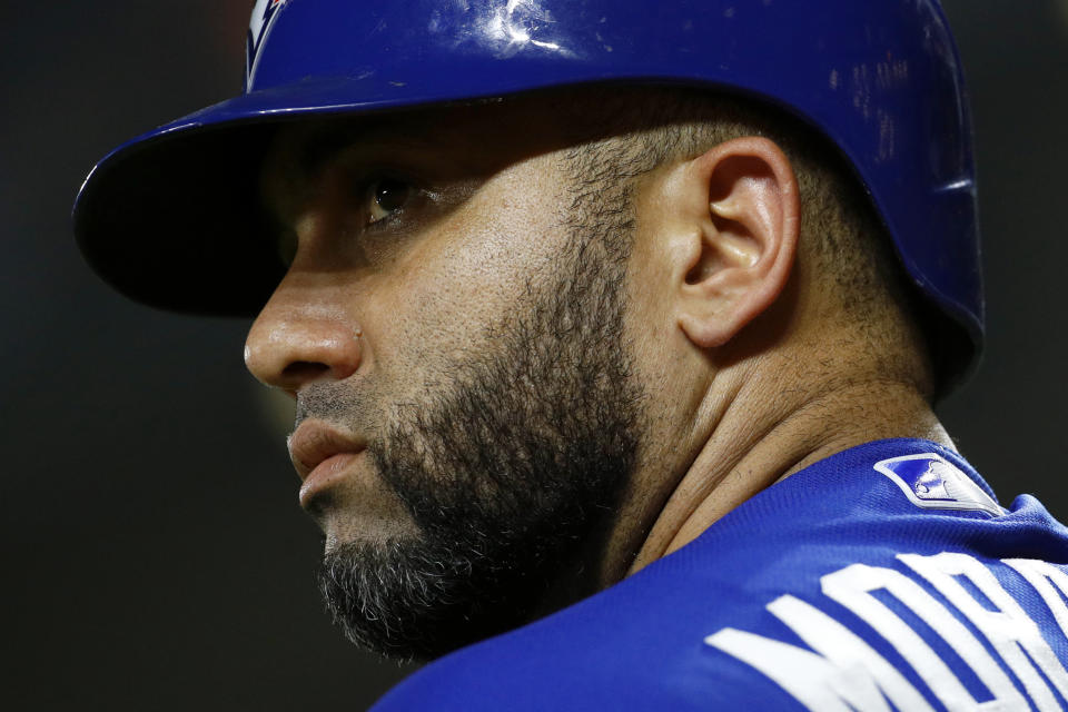 Toronto Blue Jays' Kendrys Morales prepares for an at-bat in the sixth inning of a baseball game against the Baltimore Orioles, Monday, Aug. 27, 2018, in Baltimore. After hitting home runs in seven straight games, Morales came up one short of the major league record as he went hitless Monday. (AP Photo/Patrick Semansky)