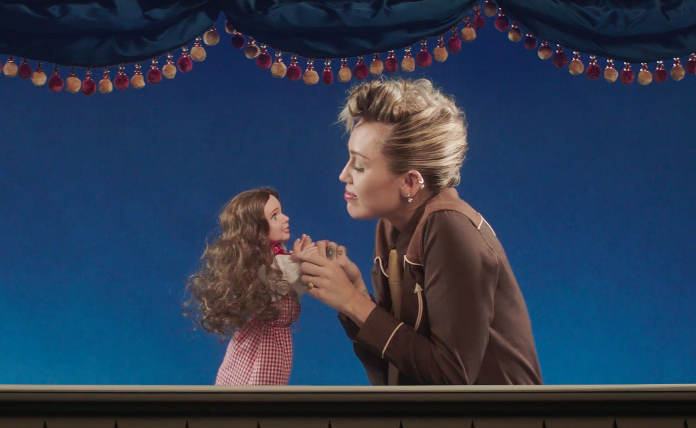 Miley Cyrus just released the video for “Younger Now,” and yes, she’s singing to a puppet