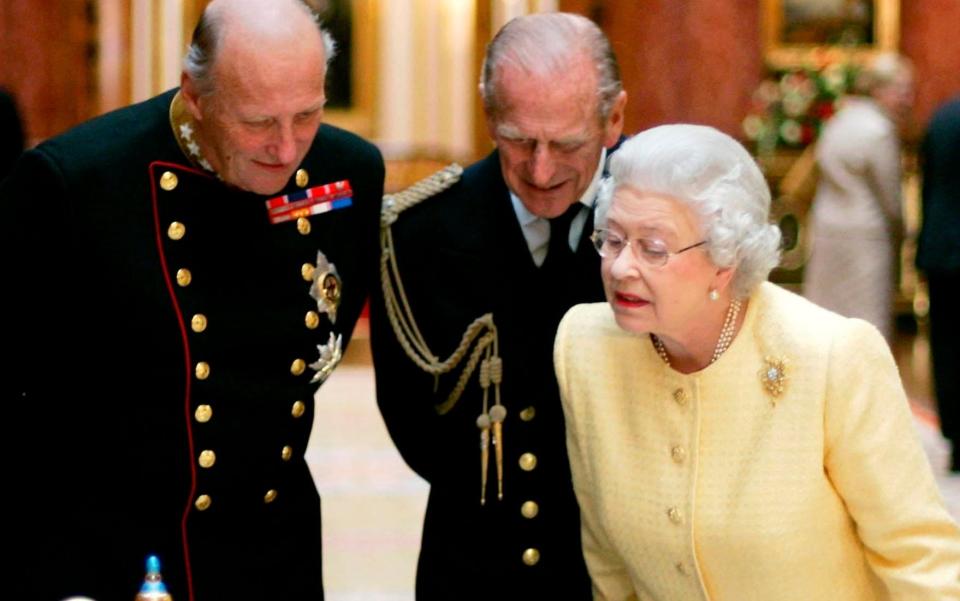 Picture 256146736 17/04/2021 at 06:02 Owner : AP FILE - In this Tuesday Oct. 25, 2005, file photo, Britain's Queen Elizabeth II, right, Prince Philip, centre, and the King Harald V, of Norway view an exhibition of Norwegian items from the Royal Collection in the Picture Gallery at Buckingham Palace in London. Prince Philip's life spanned just under an entire century of European history. His genealogy was just as broad, with Britain's longest-serving consort linked by blood and marriage to most of the continent's royal houses. (AP Photo/Matt Dunham, File) - Matt Dunham/AP Photo