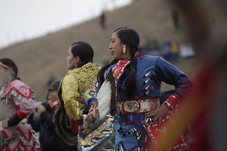 Native American dancers perform during a peaceful demonstration near the Dakota Access Pipeline construction site north of Cannon Ball, North Dakota, U.S. October 29, 2016. REUTERS/Josh Morgan