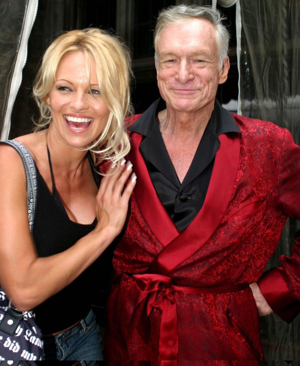 Pamela Anderson and Hugh Hefner (Photo by Laurence Cottrell/FilmMagic)