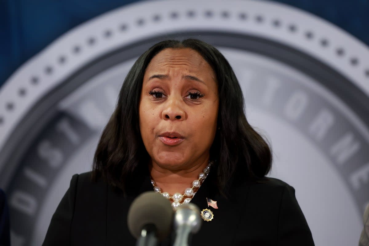 Fulton County District Attorney Fani Willis speaks during a news conference announcing the charges (Getty Images)