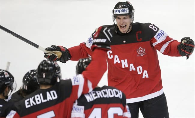 The presence of Sidney Crosby on Team Canada's roster may be boosting world championship ratings. (AP Photo/Petr David Josek)