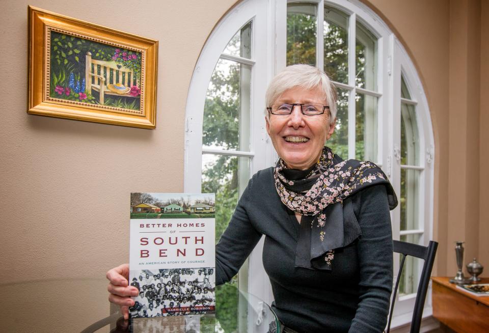 Gabrielle Robinson holds a copy of her book, “Better Homes of South Bend: An American Story of Courage.”