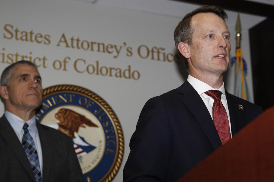 Jason R. Dunn, U.S. Attorney for the District of Colorado, right, makes a point as Dean Phillips, FBI special agent in charge, listens during a news conference in Denver Monday, Nov. 4, 2019, to announce the arrest of a man who repeatedly espoused anti-Semitic views in a plot to bomb a historic Colorado synagogue in Pueblo. Richard Holzer, 27, of Pueblo, was charged with a federal hate crime for plotting to blow up the Temple Emmanuel Synagogue in the southern Colorado city. (AP Photo/David Zalubowski)