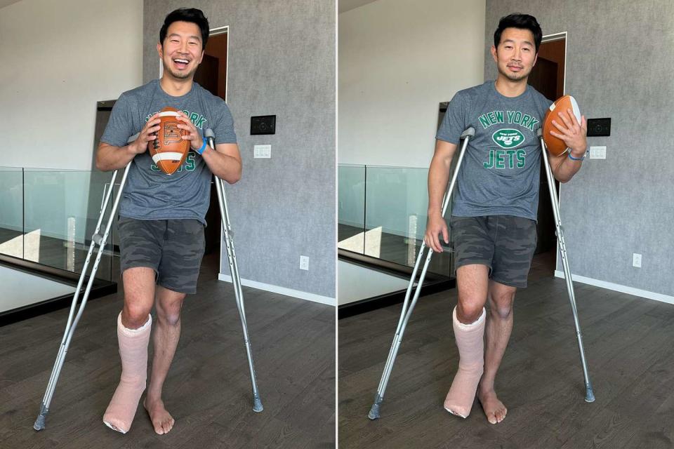 <p>Simu Liu/ Instagram</p> Simu Liu dresses up as Aaron Rodgers for Halloween 2023 after both tore their Achilles tendons.