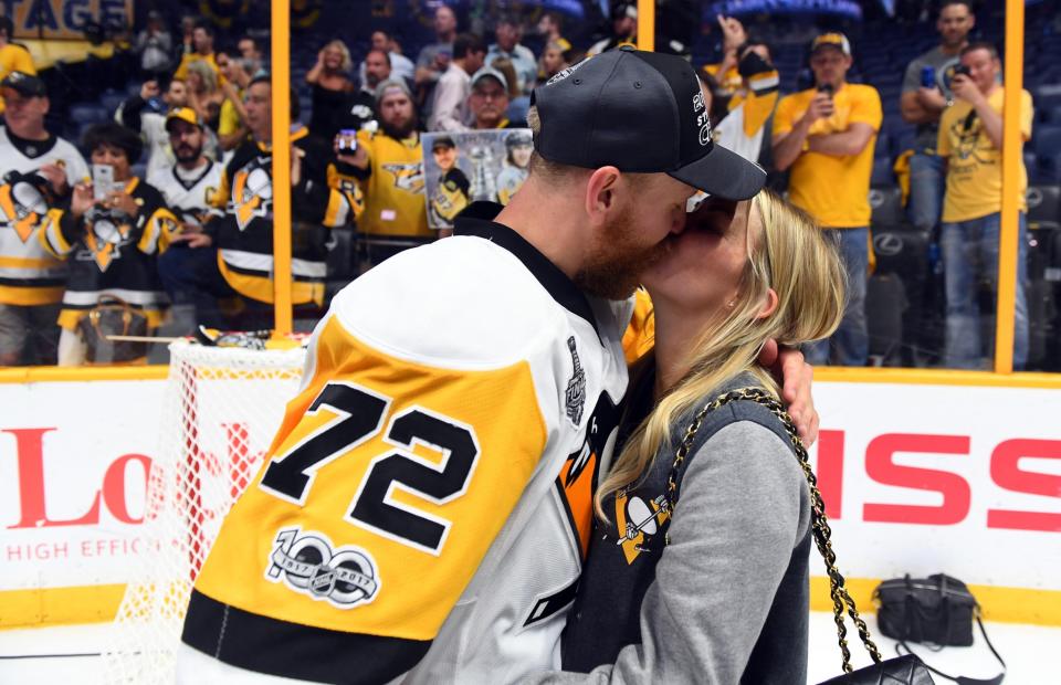 <p>Pittsburgh Penguins right wing Patric Hornqvist (72) kisses his wife Malin after defeating the Nashville Predators Game 6 of the 2017 Stanley Cup Final at Bridgestone Arena. Credit: Christopher Hanewinckel-USA TODAY Sports </p>