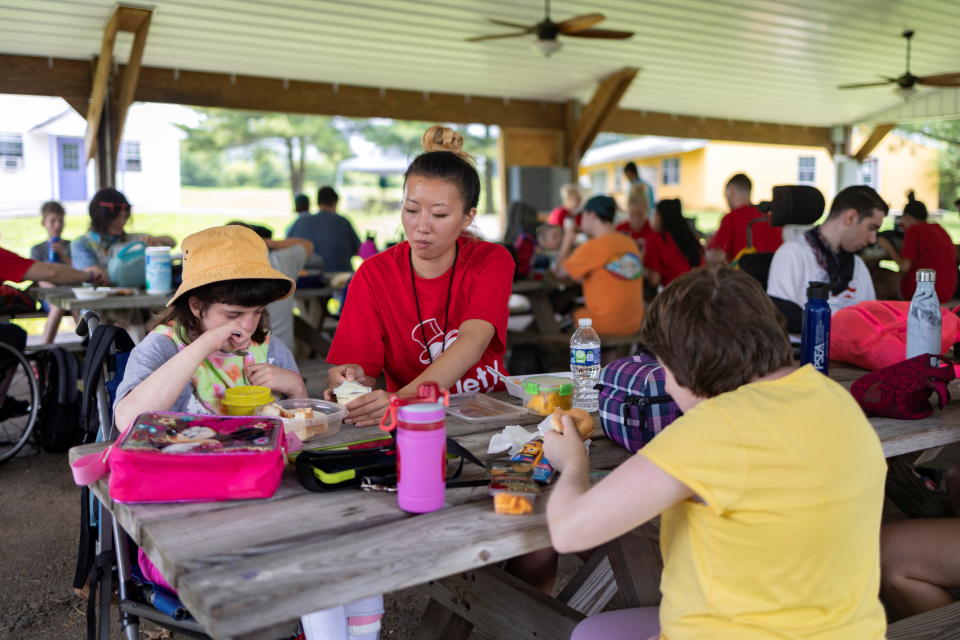 Special needs children eat lunch as summer camp begins at Variety - the Children's Charity of the Delaware Valley in Worcester, Pennsylvania, U.S., June 21, 2021.  REUTERS/Hannah Beier