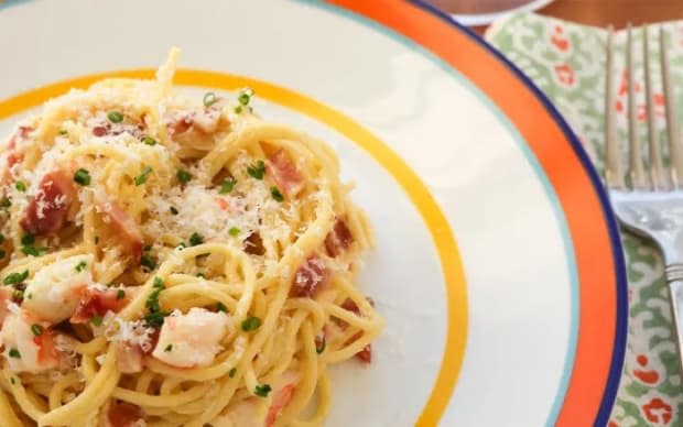 <p><a href="https://parade.com/695468/jonashton/bacon-and-shrimp-carbonara/" rel="nofollow noopener" target="_blank" data-ylk="slk:Jon Ashton;elm:context_link;itc:0;sec:content-canvas" class="link ">Jon Ashton</a></p>