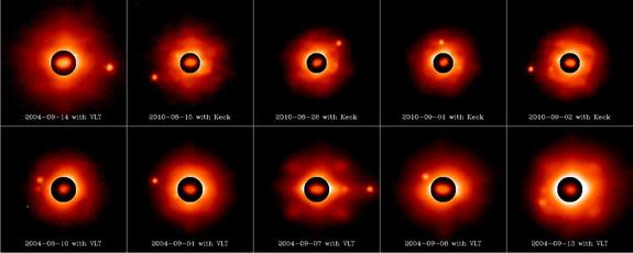 Sylvia and its moons as seen from the 8 to 10-meter class telescopes with adaptive optics. The dark circle shows the irregular shape of the asteroid. The small satellites can be seen at various positions on these images.