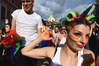 <p>Revellers take part at the Gay Pride Parade in downtown Rome on June 9, 2018. (Photo: Vincenzo Pinto/AFP/Getty Images) </p>