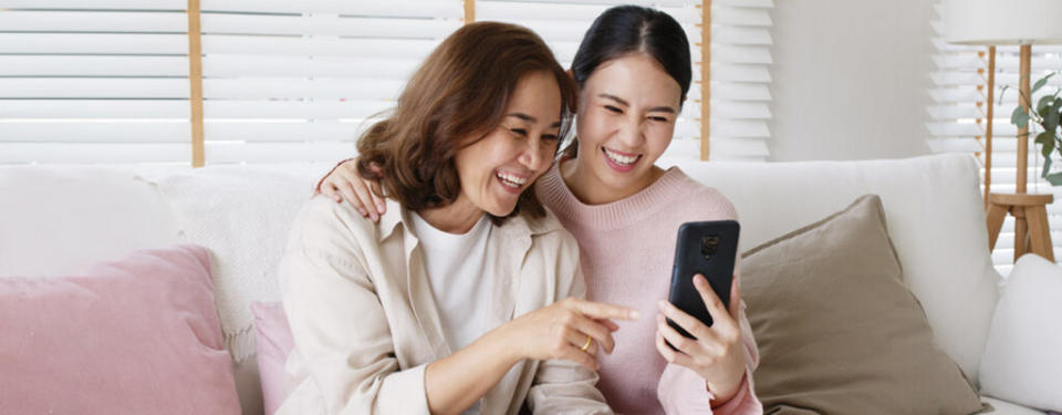 mother and daughter on cellphone