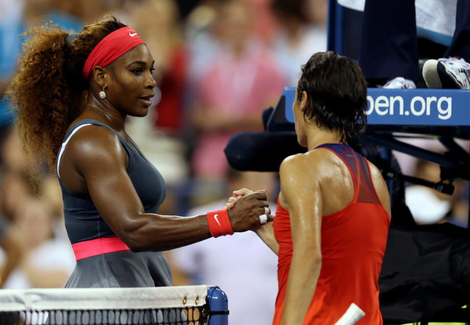 NEW YORK, NY - AUGUST 26:  Serena Williams of the United States shakes hands with  Francesca Schiavone of Italy after their first round women's singles match on Day One of the 2013 US Open at USTA Billie Jean King National Tennis Center on August 26, 2013 in the Flushing neighborhood of the Queens borough of New York City.  (Photo by Matthew Stockman/Getty Images)