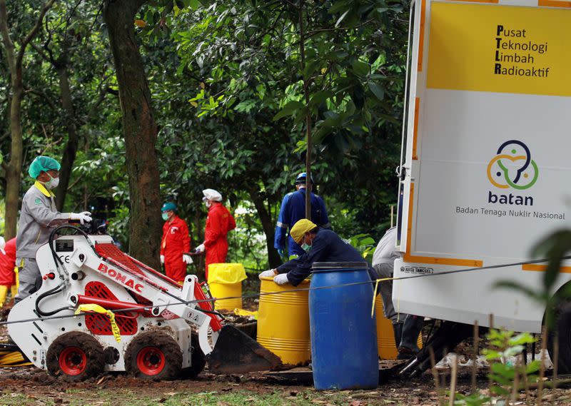 The National Nuclear Energy Agency of Indonesia (BATAN) and Nuclear Energy Regulatory Agency (BAPETEN) decontaminate the soil that is exposed to radioactive waste in the residential area of Batan Indah, Tangerang, near Jakarta