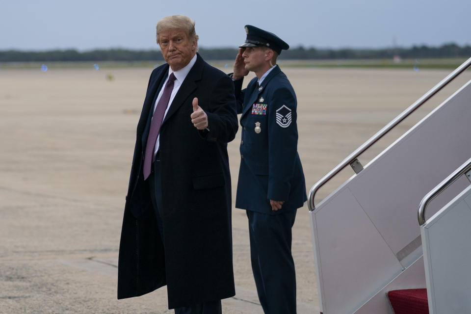 President Donald Trump gives a thumbs up as he arrives at Andrews Air Force Base after attending a fundraiser at Trump National Golf Club in Bedminster, Thursday, Oct. 1, 2020, in Andrews Air Force Base, Md. (AP Photo/Evan Vucci)