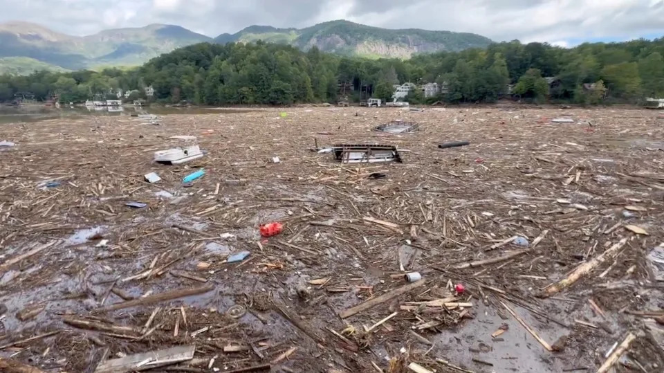 Debris floats in Lake Lure in North Carolina after Hurricane Helene on Sunday. 