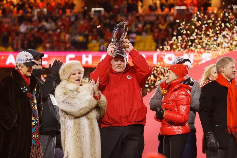 KANSAS CITY, MISSOURI - JANUARY 29: Head coach Andy Reid of the Kansas City Chiefs holds up the Lamar Hunt Trophy after defeating the Cincinnati Bengals 23-20 in the AFC Championship Game at GEHA Field at Arrowhead Stadium on January 29, 2023 in Kansas City, Missouri. (Photo by David Eulitt/Getty Images)