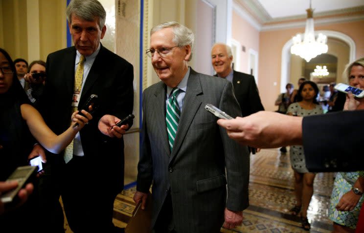  Senator Majority Leader Mitch McConnell walks to the Senate floor after unveiling a draft bill on health care.