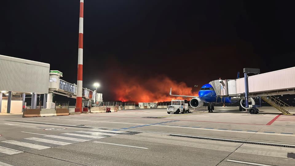 A wildfire burns near the Sicilian airport Falcone-Borsellino in Palermo, Italy, July 25, 2023. . - Ufficio Stampa Gesap via Reuters