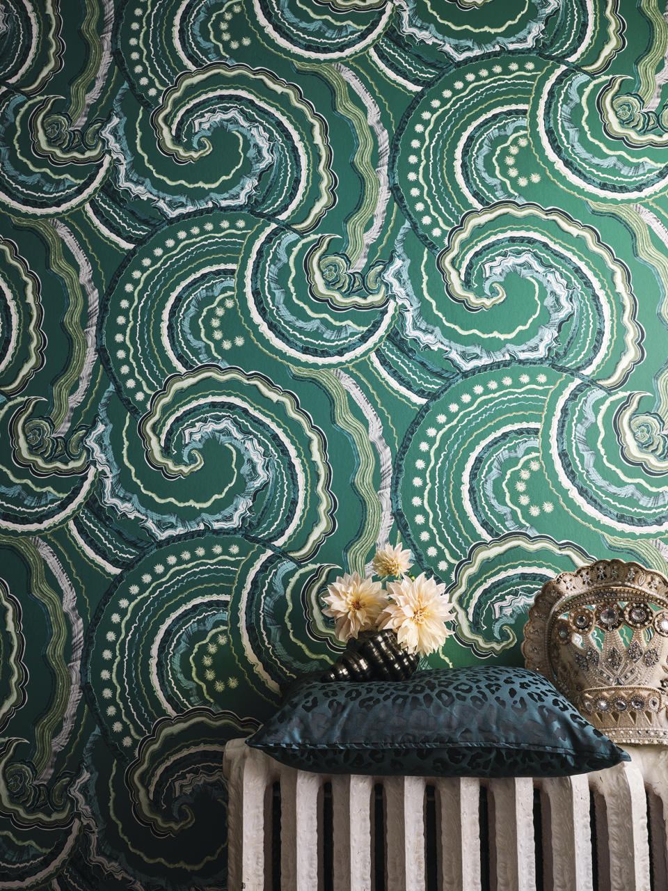 This image eleased by Romo and Temperley London shows a sea agate wallpaper pattern. Wallpaper is back in a big way, decor experts say, and many make a statement through story or texture. (Romo and Temperley London via AP)