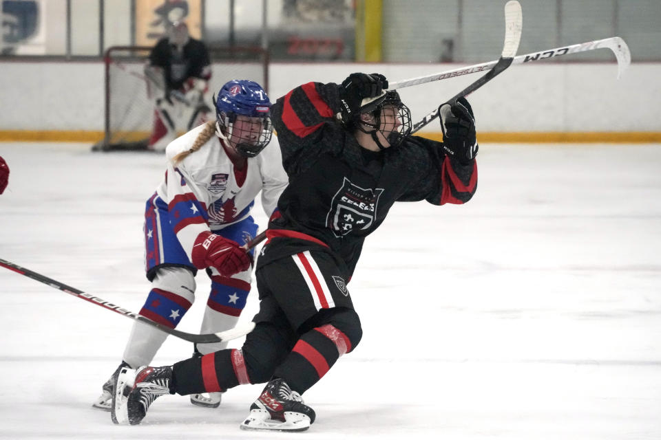 Bishop Kearney Selects Under-19 girls team winger Nela Lopusanova, right, plays in a Labor Day Weekend hockey tournament in Pittsburgh, Friday, Sept. 1, 2023. (AP Photo/Gene J. Puskar)