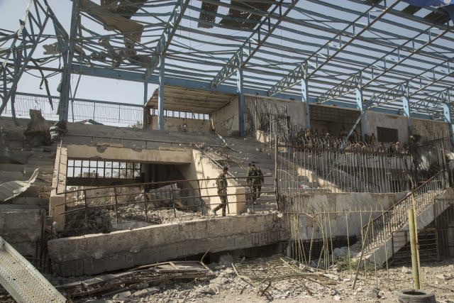 Wrecked buildings in Raqqa