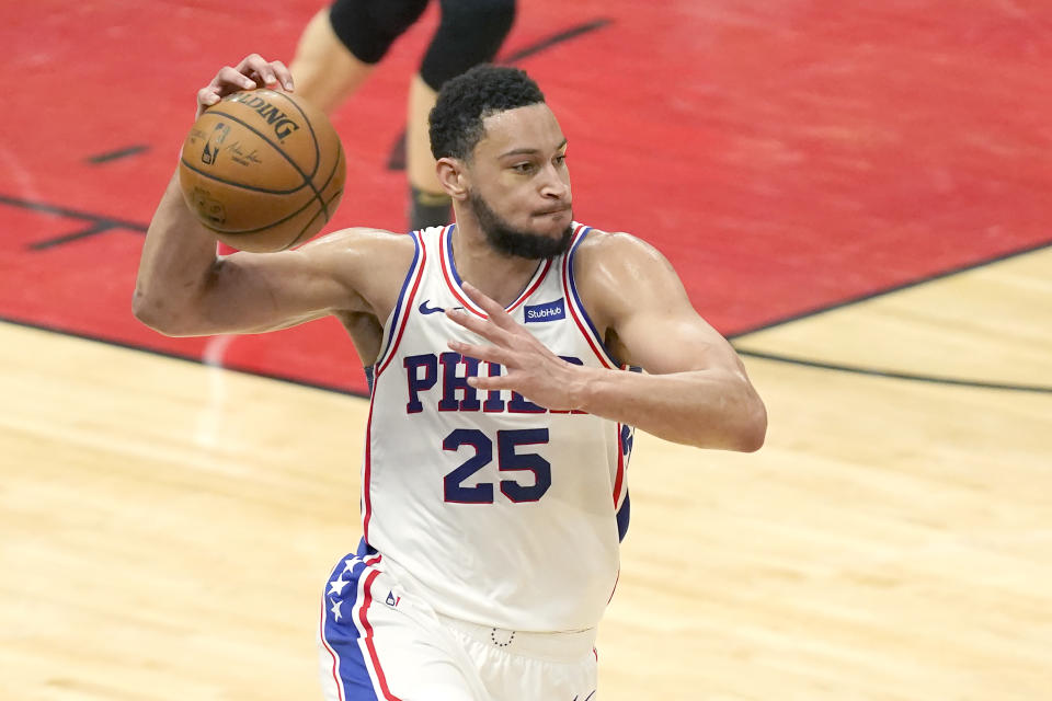 FILE- In this May 3, 2021, file photo, Philadelphia 76ers' Ben Simmons looks to pass during the second half of an NBA basketball game against the Chicago Bulls in Chicago. Simmons will not report to Philadelphia 76ers' training camp week and prefers to continue his NBA career with another team, a person with direct knowledge of the player’s plans told The Associated Press on Tuesday, Sept. 21, 2021. The person spoke on the condition of anonymity because discussions of Simmons' plans with the franchise have been private. (AP Photo/Charles Rex Arbogast, File)