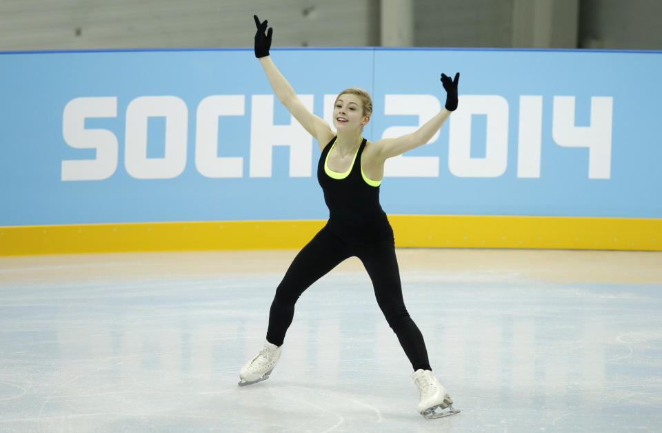 Gracie Gold of the United States skates during a practice session at the figure stating practice rink at the 2014 Winter Olympics, Tuesday, Feb. 18, 2014, in Sochi, Russia. (AP Photo/Darron Cummings)