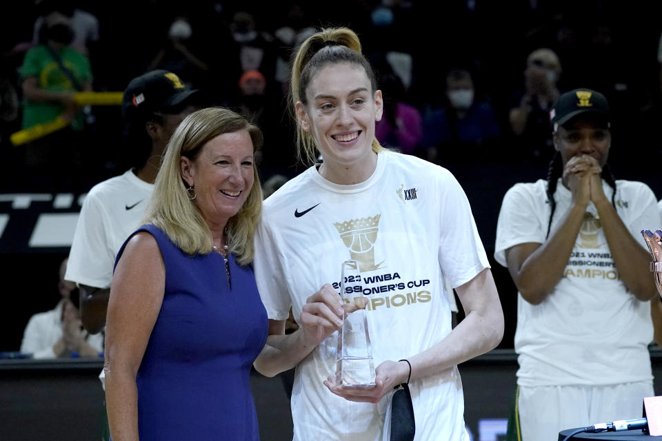 Seattle Storm forward Breanna Stewart holds the MVP trophy after the Commissioner's Cup WNBA basketball game against the Connecticut Sun, Thursday, Aug. 12, 2021, in Phoenix. (AP Photo/Matt York)