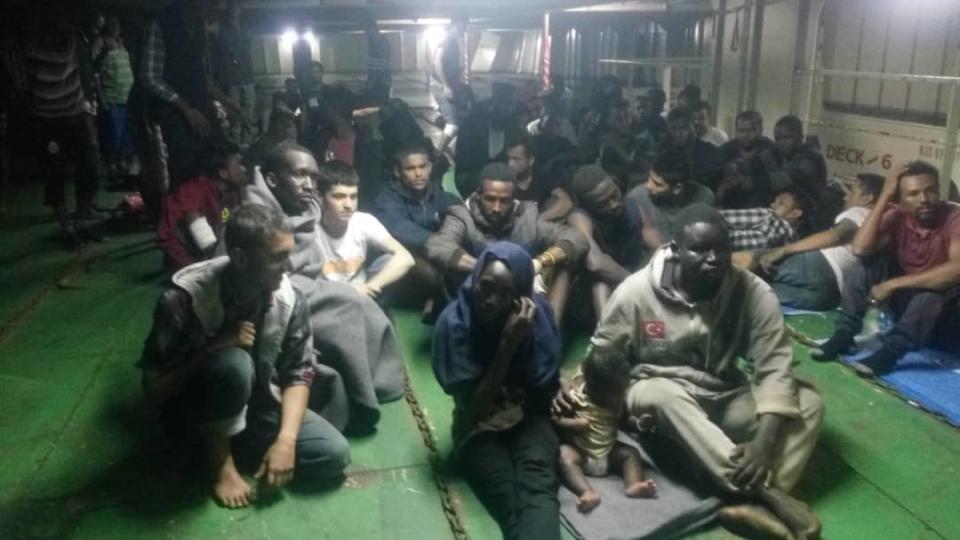 In this photo provided Nov. 14, 2018, migrants on board the container ship Nivin are refusing to disembark in Misrata, Libya. A total of 91 migrants, including a baby, were rescued by the ship’s crew last weekend after leaving Libya in a raft. (AP Photo)