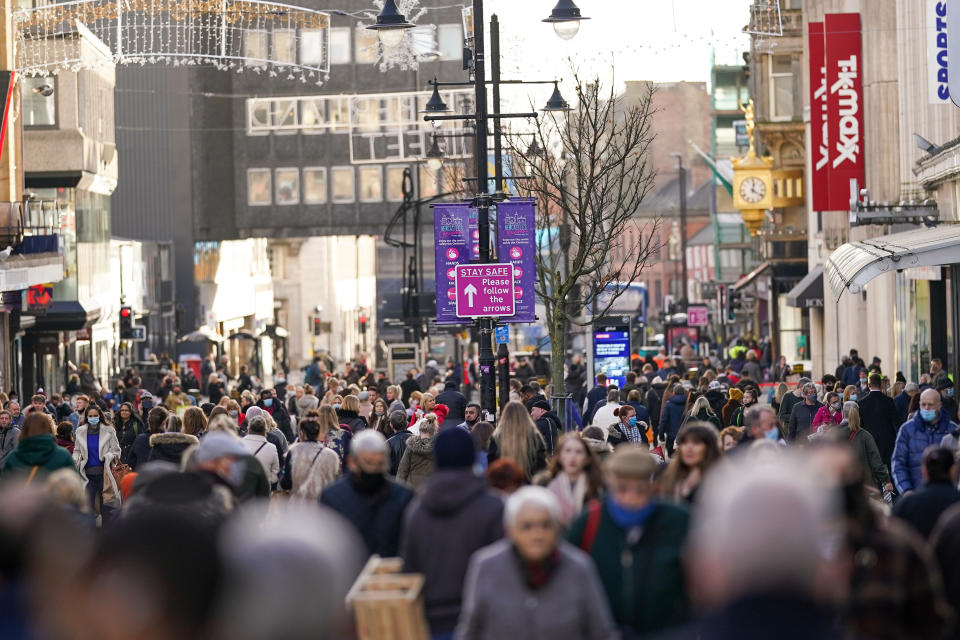 NEWCASTLE UPON TYNE, ENGLAND - DECEMBER 02: Shoppers walk along Northumberland Street in Newcastle city centre on December 02, 2020 in Newcastle upon Tyne, England. Today is the first day of the new Tier system introduced at the end of the second Coronavirus lockdown to prevent against further spread of the Coronavirus. Newcastle has been put into Tier 3 restrictions. (Photo by Ian Forsyth/Getty Images)