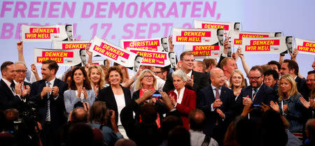 Free Democratic Party (FDP) members gather on the stage at the FDP party convention in Berlin, Germany, September 17, 2017. REUTERS/Axel Schmidt