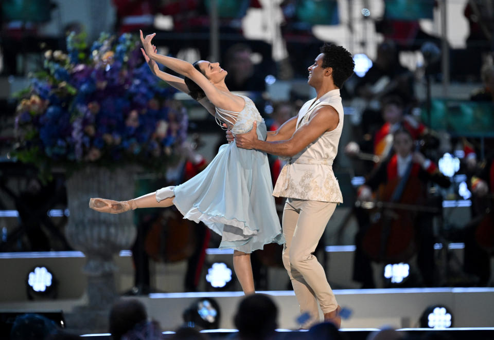 WINDSOR, ENGLAND - MAY 07: Marcelino Sambe and Francesca Hayward perform on stage during the Coronation Concert on May 07, 2023 in Windsor, England. The Windsor Castle Concert is part of the celebrations of the Coronation of Charles III and his wife, Camilla, as King and Queen of the United Kingdom of Great Britain and Northern Ireland, and the other Commonwealth realms that took place at Westminster Abbey yesterday. High-profile performers will entertain members of the royal family and 20,000 guests including 10,000 members of the public. (Photo by Leon Neal/Getty Images)