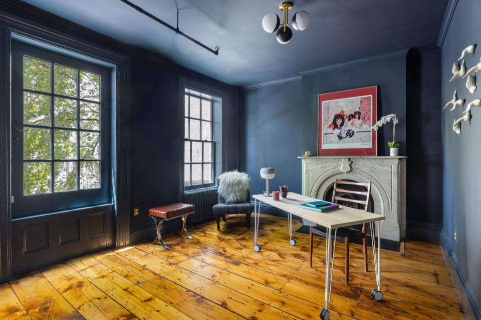 office with blue walls and ceiling