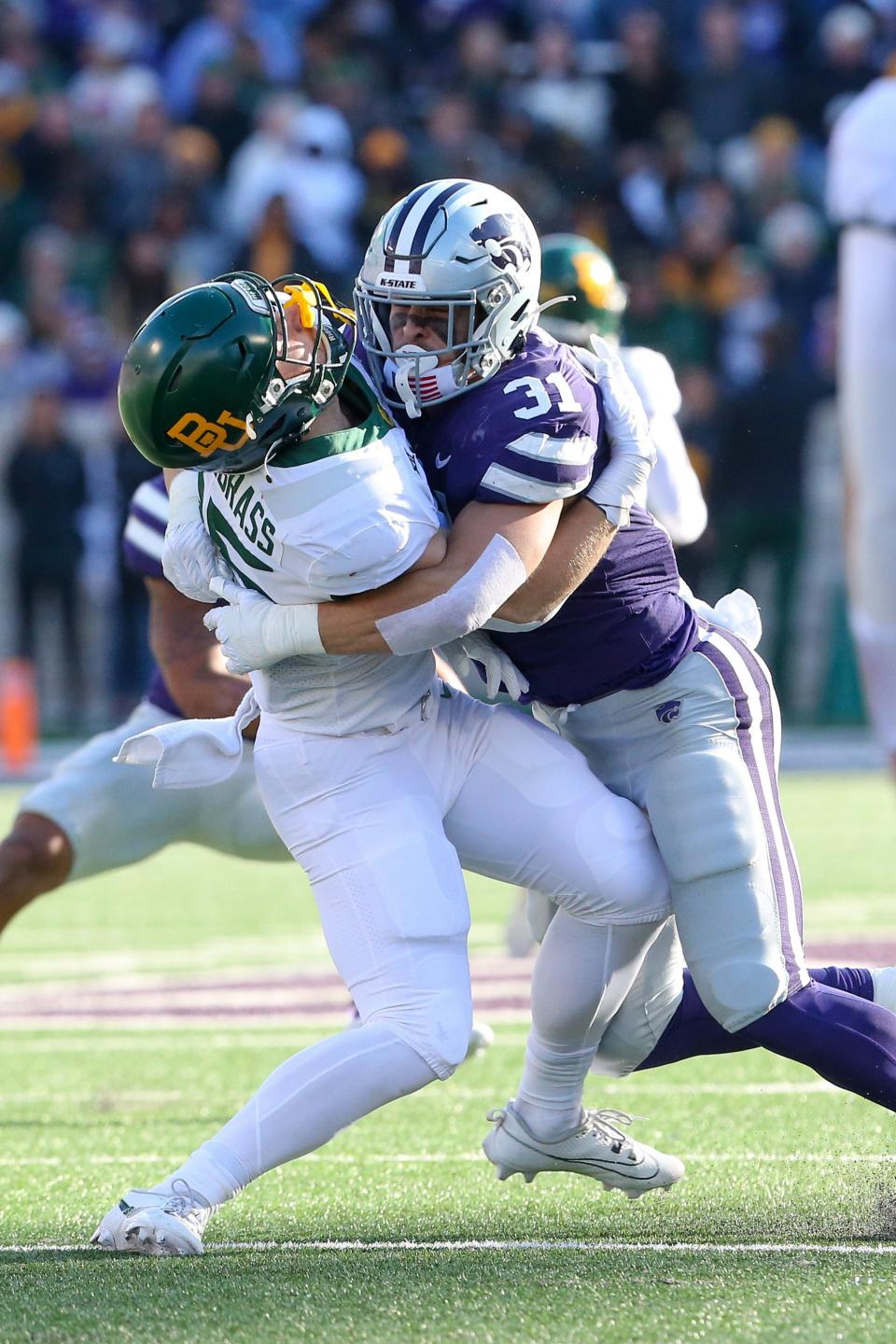 Kansas State linebacker Jake Clifton (31) hits Baylor's Dawson Pendergrass (35) on an incomplete pass last Saturday at Bill Snyder Family Stadium.