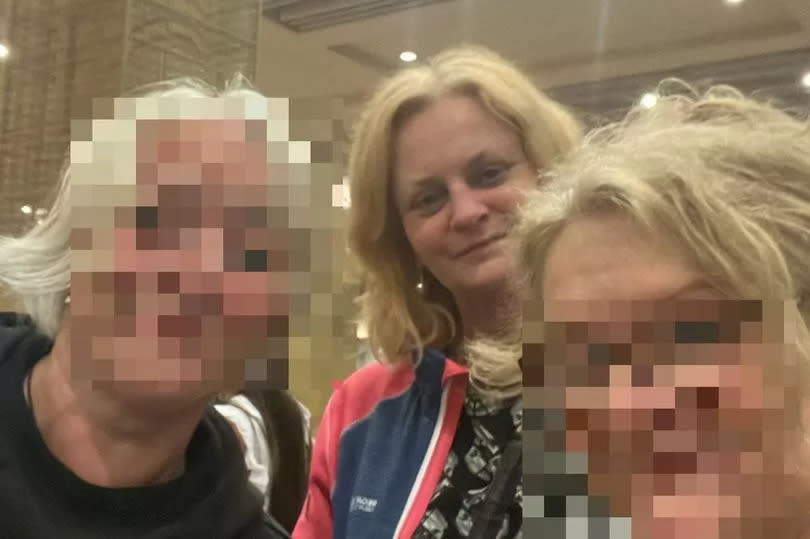 Karen McArthur, pictured middle, with her friends, who did not wish to reveal their names -Credit:Karen McArthur