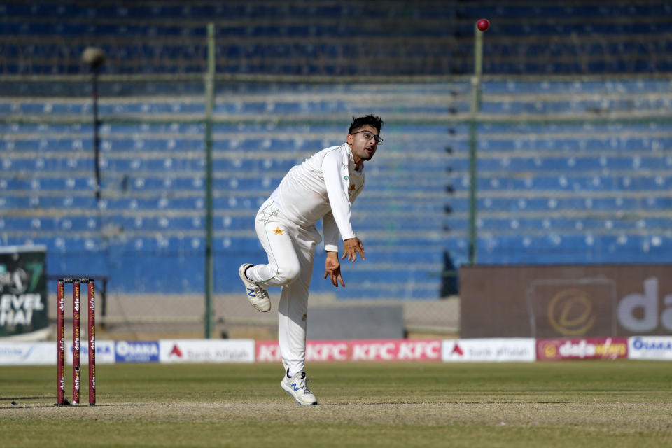 Pakistan's Abrar Ahmed bowls during the fourth day of first test cricket match between Pakistan and New Zealand, in Karachi, Pakistan, Thursday, Dec. 29, 2022. (AP Photo/Fareed Khan)
