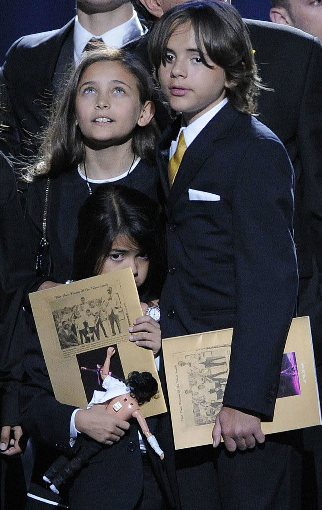 Paris and Prince as kids at their dad's funeral