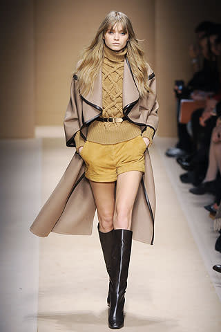 This leather-trimmed cape by Ferragamo almost looks like a trench coat.