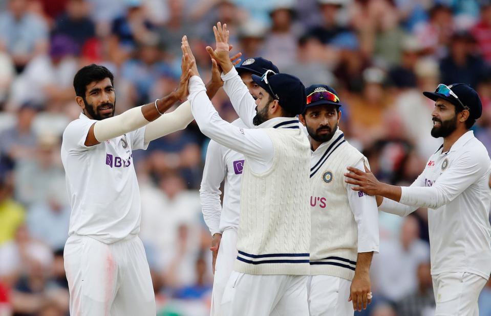 Jasprit Bumrah celebrates taking the wicket of Jos Buttler (Reuters)