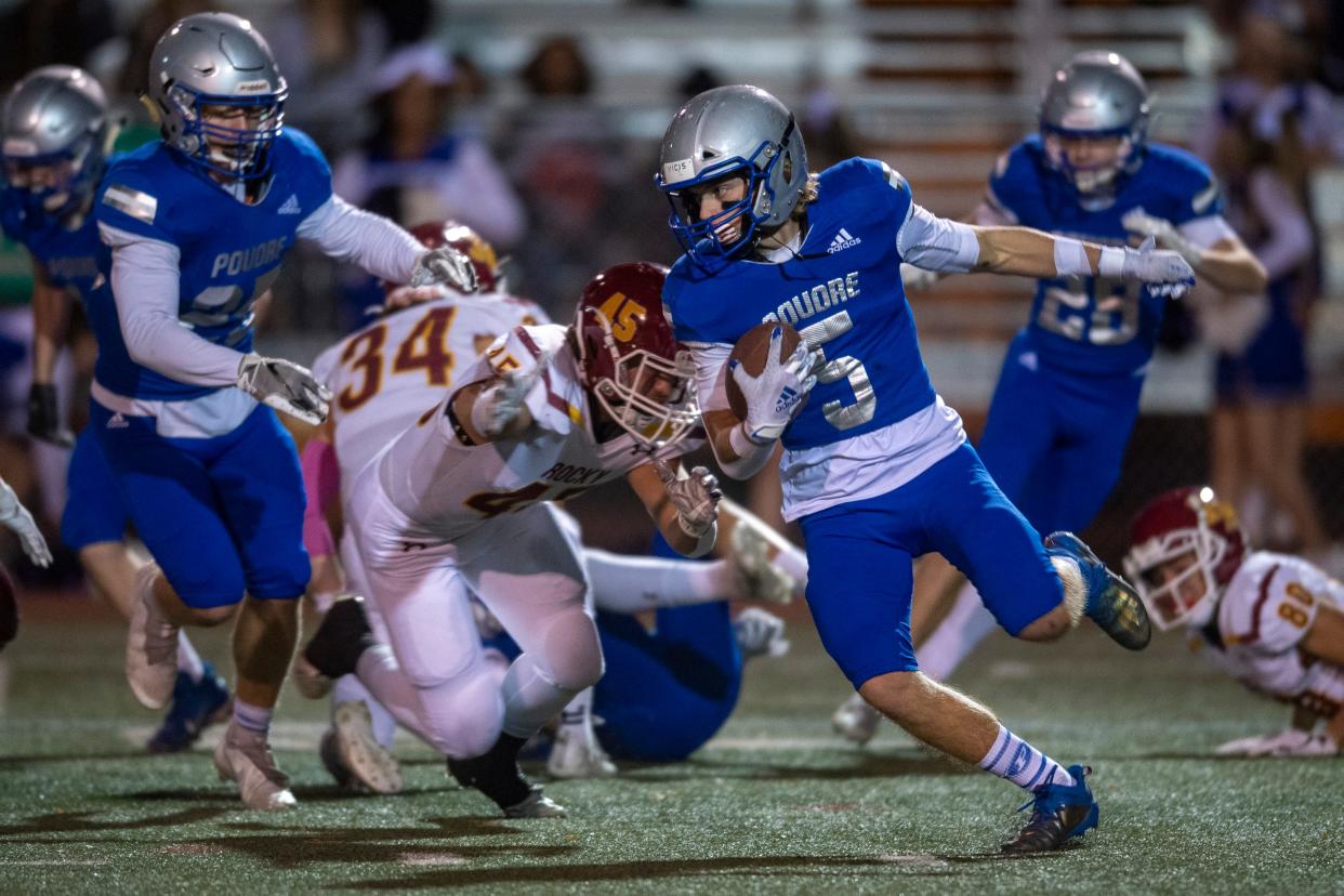 Poudre High school running back Jordan Niesent carries the football during an Oct. 29, 2021, game against Rocky Mountain at French Field. The city rivals will meet again Friday, Sept. 30, in the first game of a city rivalry doubleheader, the Canvas Community Classic, at Colorado State's Canvas Stadium.