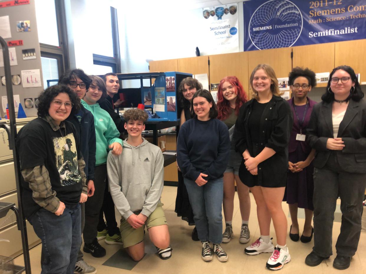 Members of the 2022-23 research class at Adams High School pose for a photo. Taught since 1976, the course has a number of alumni who have continued in research and professional fields.